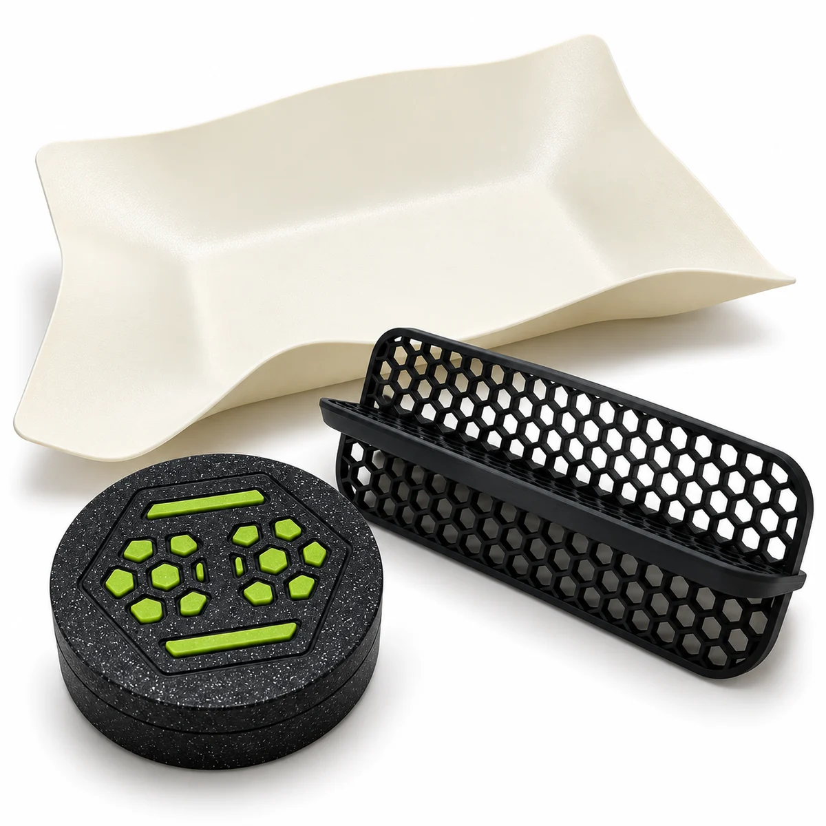 Cream sculptural tray, black honeycomb rolling stand and black and green HoneyRoll grinder